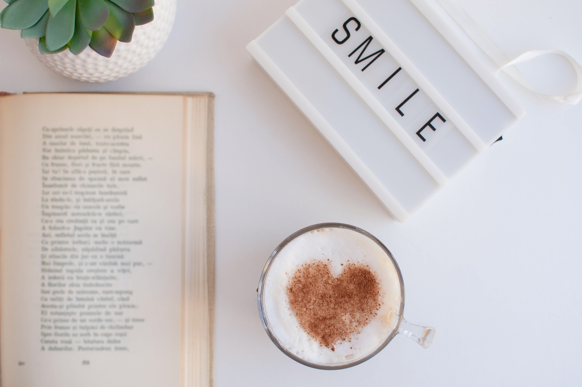 Morning routine, a coffee and a poem book